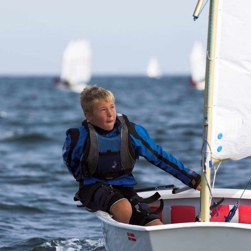 young-boy-sailing-alone